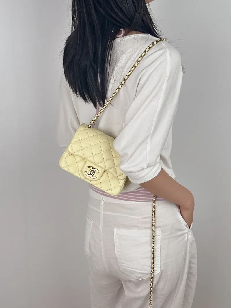 Chanel Crossbody Bag c Yellow Lambskin Mini 17 × 8 × 13.5 cm — on-model view 1 of 3