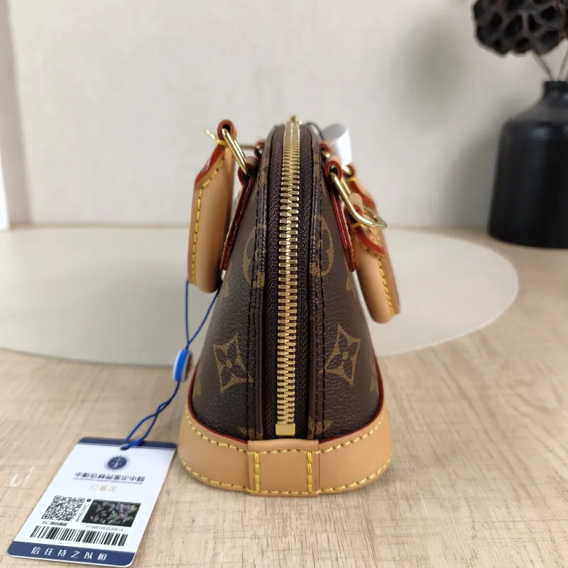 Louis Vuitton Crossbody Bag Alma Nano Monogram PVC nano 18 × 8 × 12 cm — detail view 4 of 12