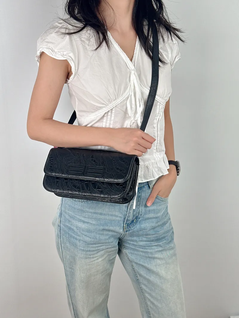 BALENCIAGA Shoulder Bag GOSSIP Black CC alfskin Small 23.5 × 10.5 × 12.5 cm — on-model view 2 of 3