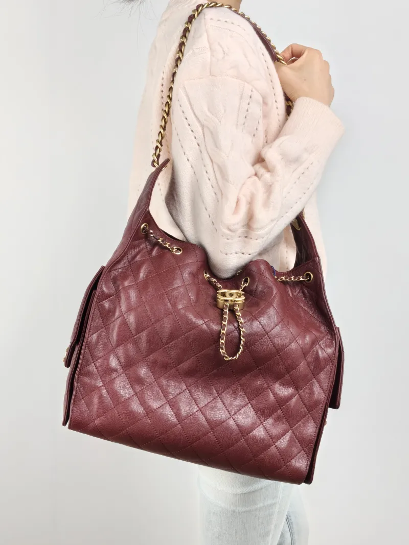 Chanel Shoulder Bag 25Bag Red Grained Calfskin Medium 30 × 15 × 40 cm — on-model view 1 of 2