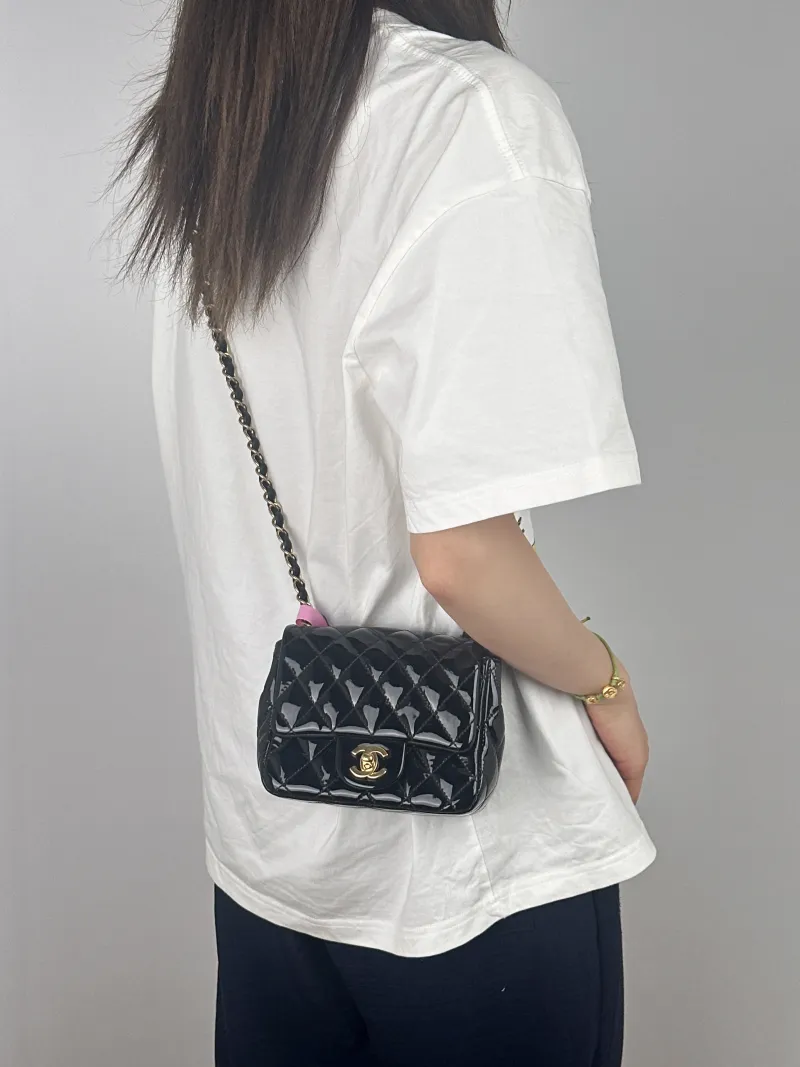 Chanel Crossbody Bag Classic Flap Mini CF Mini Black with Gold-Tone Hardware Patent Leathermini17 × 8 × 13.5 cm — on-model view 1 of 2