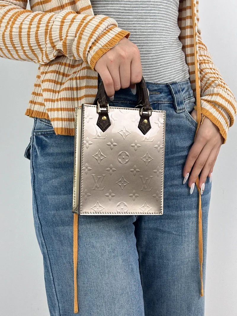 Louis Vuitton Crossbody Bag PETIT SAC PLAT Mini Silver PV Cmini14 × 5 × 17 cm — on-model view 1 of 2