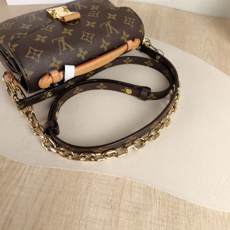 Louis Vuitton Crossbody Bag Pochette Métis East West Monogram PVC Small 21.5 × 6 × 13.5 cm — detail view 14 of 14