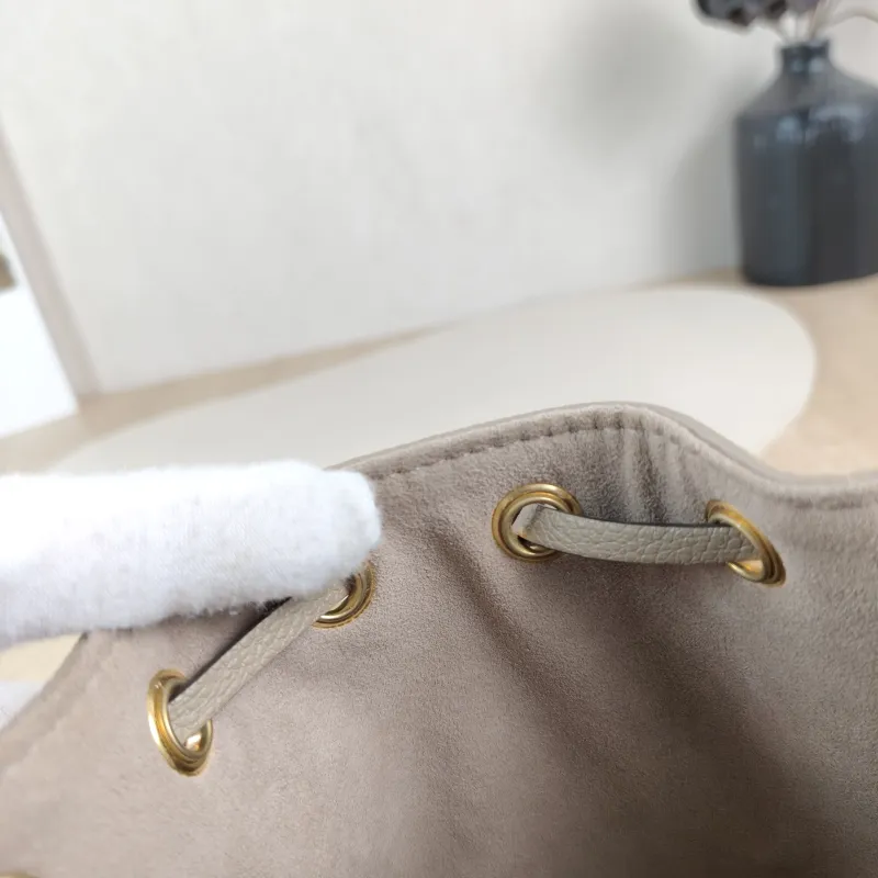 Louis Vuitton Crossbody Bag NANO NOÉ Bucket Bag Nano · White Empreinte Embossed Calfskin nano 13 × 10 × 16 cm — detail view 6 of 10