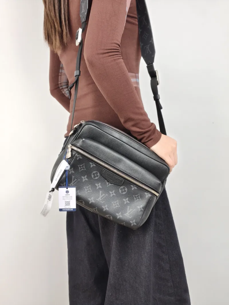 Louis Vuitton Crossbody Bag Outdoor Messenger Bag Black PVC · Calfskin 26 × 10.5 × 20 cm — on-model view 1 of 2
