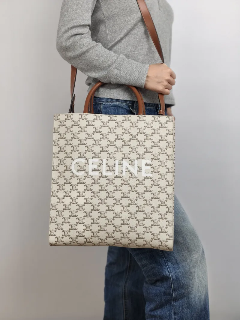 CELINE Crossbody Bag CABAS White Monogram PVC Medium 31.5 × 5 × 35 cm — on-model view 2 of 3