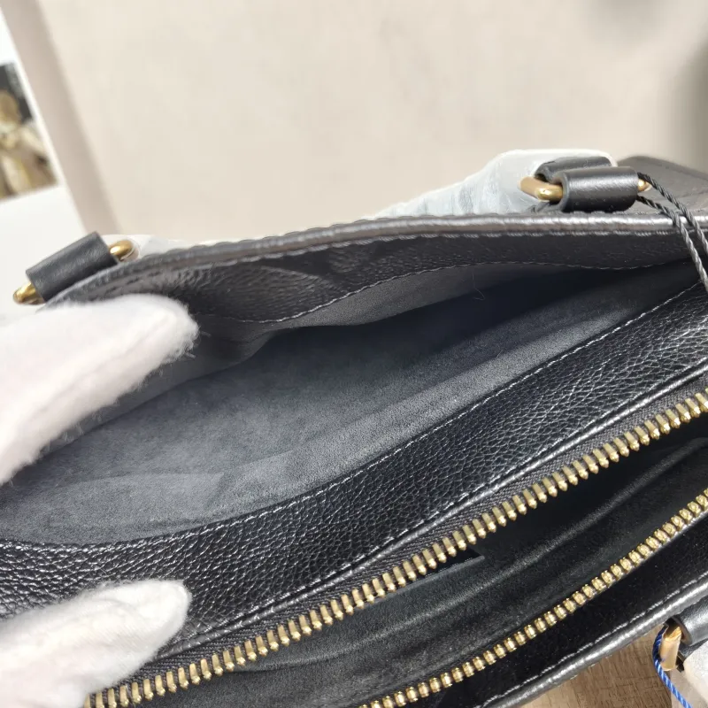 Louis Vuitton Crossbody Bag Onthego East West Two Straps Black Empreinte Embossed Calfskin Small 25 × 10 × 13 cm — detail view 10 of 12