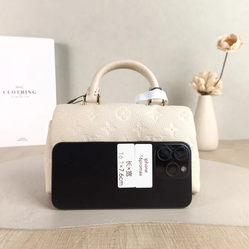 Louis Vuitton Crossbody Bag MADELEINE White Empreinte Embossed Calfskin nano 21 × 6 × 12.5 cm — cover view 2 of 5