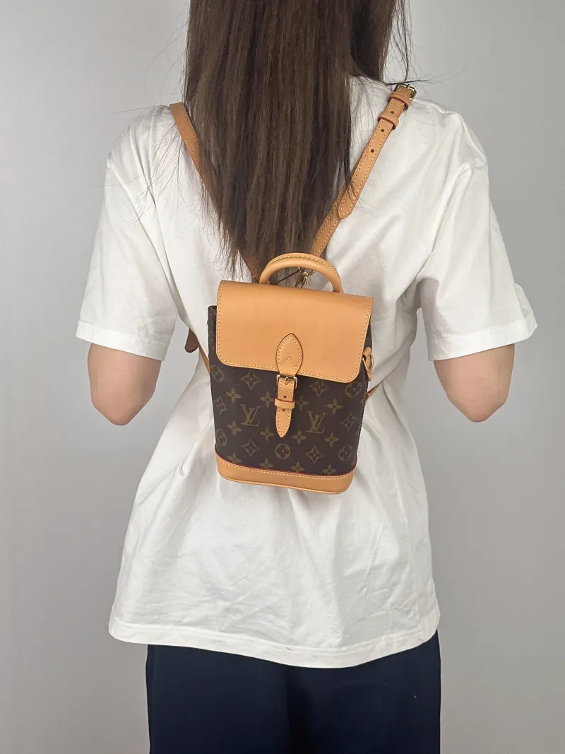 Louis Vuitton Backpack Soho Backpack Monogram PV Cmini17 × 8 × 23 cm — on-model view 1 of 3