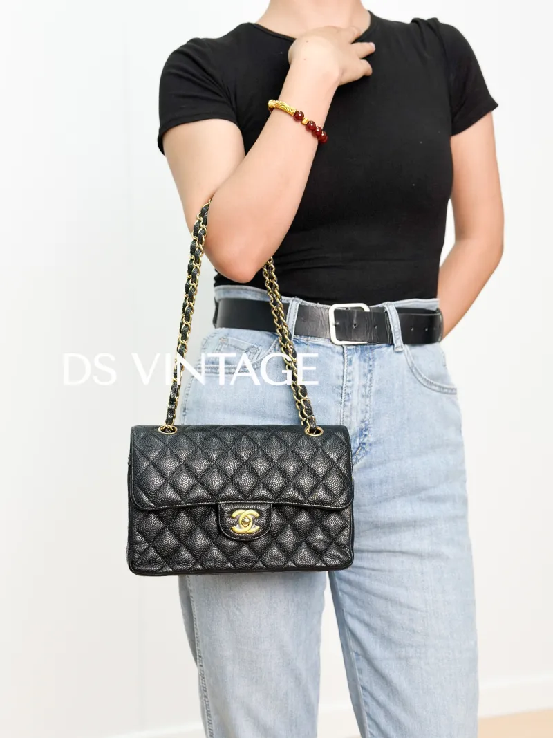Chanel Crossbody Bag Classic Flap CF Black Grained Calfskin Small23 × 6 × 14.5 cm — on-model view 1 of 4