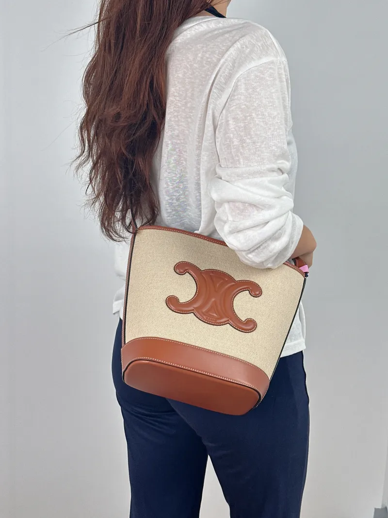 CELINE Shoulder Bag BUCKET TRIOMPHE Bucket Bag · Small 17 × 10 × 22 cm — on-model view 2 of 2