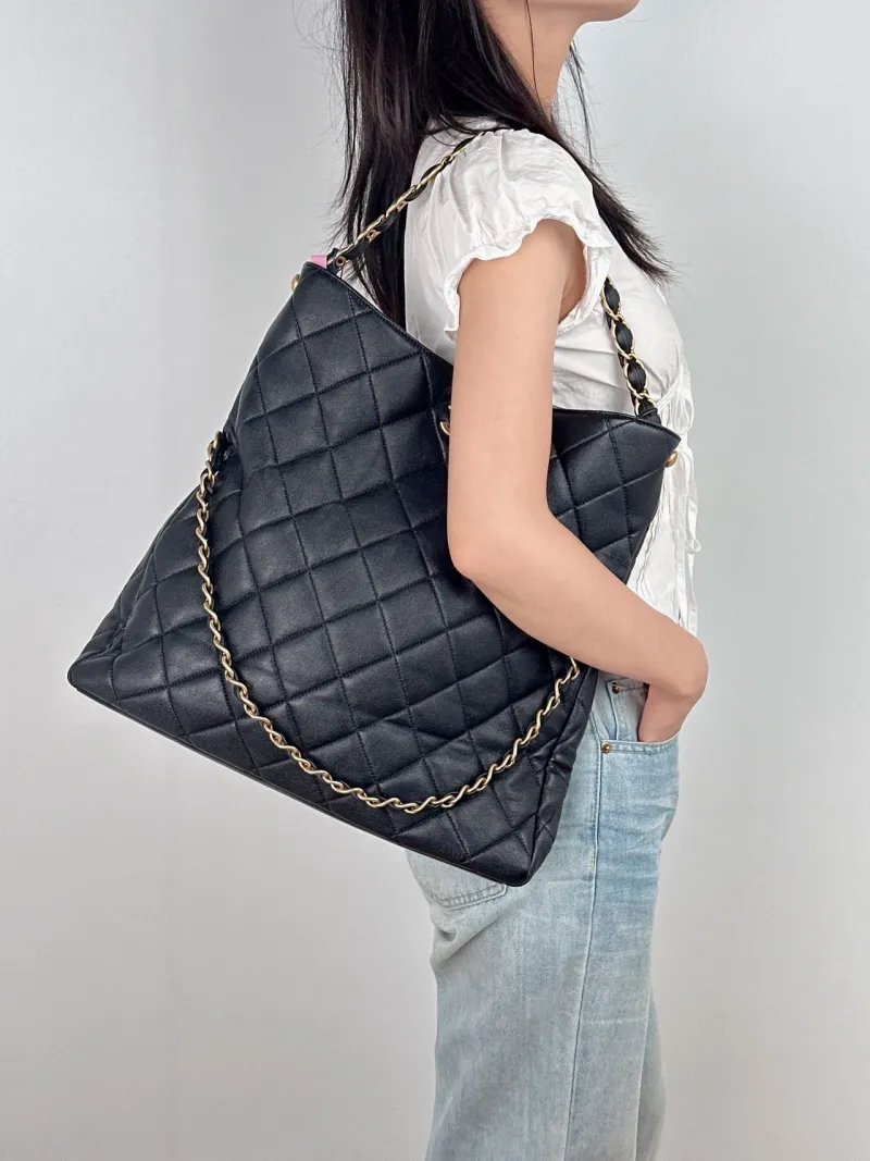 Chanel Shoulder Bag hobo Black Lambskin One Size 39 × 9 × 23 cm — on-model view 2 of 2