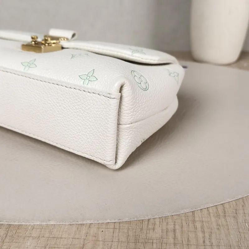 Louis Vuitton Crossbody Bag MADELEINE White · Green Calfskin nano 21 × 6 × 12.5 cm — detail view 10 of 11