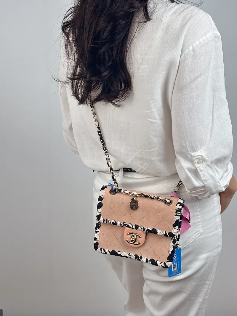 Chanel Crossbody Bag Edition Pink Suede 19 × 5 × 13.5 cm — on-model view 1 of 2