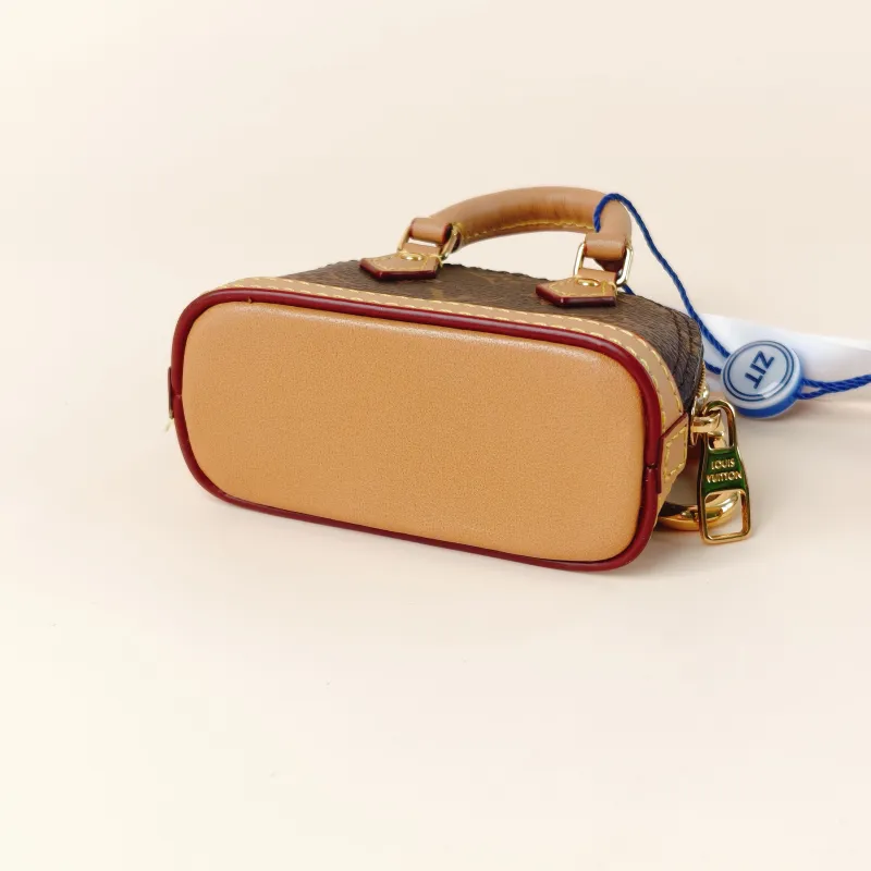 Louis Vuitton Key Ring alma Key Ring Monogram PVC One Size 8 × 4 × 6 cm — cover view 5 of 9