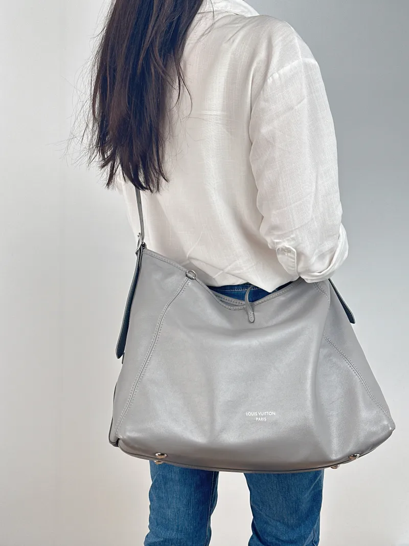 Louis Vuitton Crossbody Bag Carryall Vibe Grey SL ambskin Medium 39 × 15 × 30 cm — on-model view 2 of 2