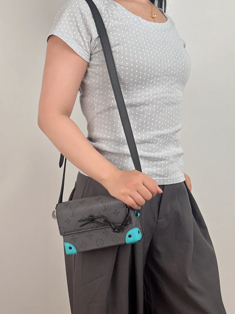 Louis Vuitton Crossbody Bag Steamer Box Grey · Blue PVC · Calfskin Mini 18 × 6.5 × 11 cm — on-model view 1 of 2