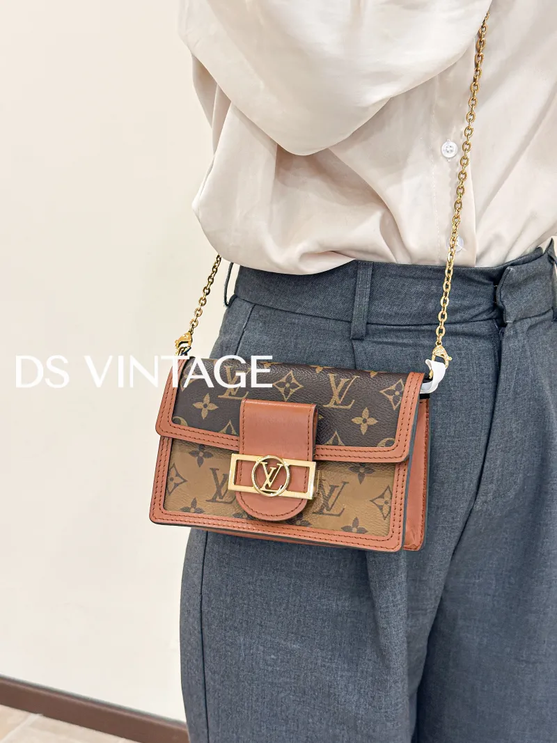Louis Vuitton Crossbody Bag Dauphine Woc Woc Monogram PVC Mini 18.5 × 5 × 12 cm — on-model view 2 of 4