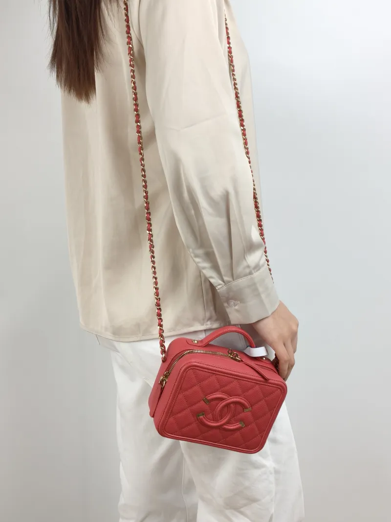 Chanel Crossbody Bag CC Filigree Vanity Cosmetic Bag Pink Grained Calfskin Small 17 × 7 × 13 cm 29 — on-model view 1 of 3