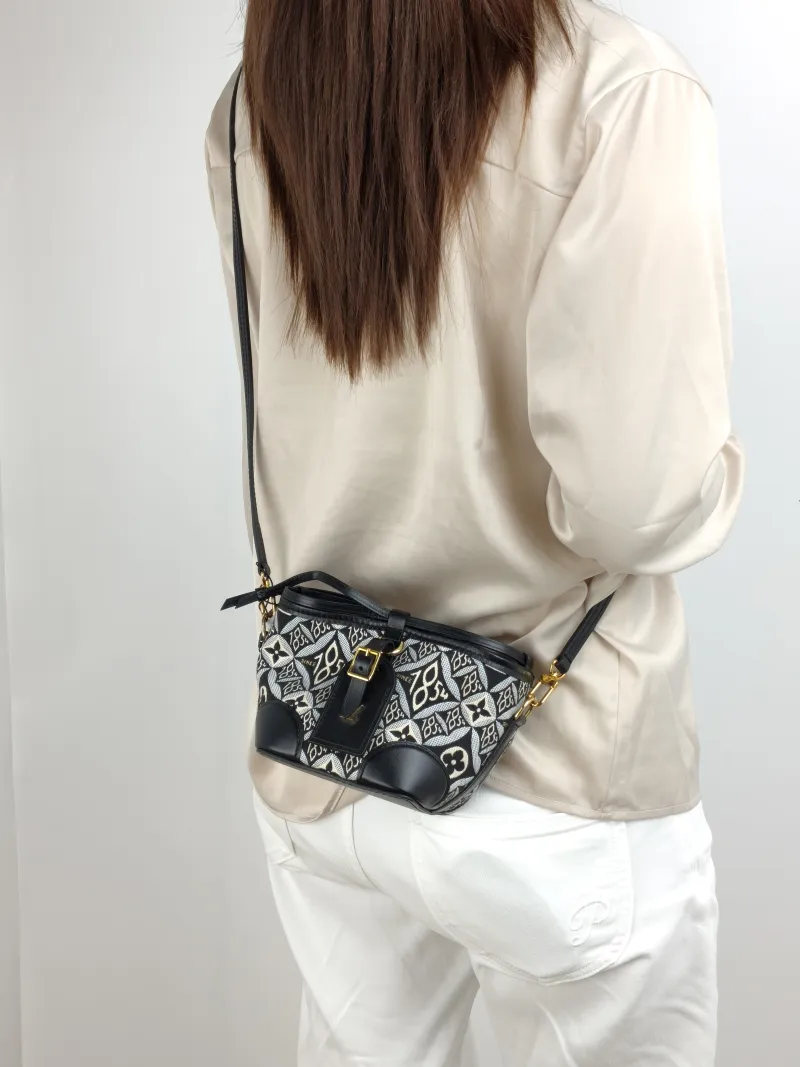Louis Vuitton Crossbody Bag NOÉ PURSE 1854 Mini 11.5 × 11.5 × 12 cm — on-model view 2 of 2