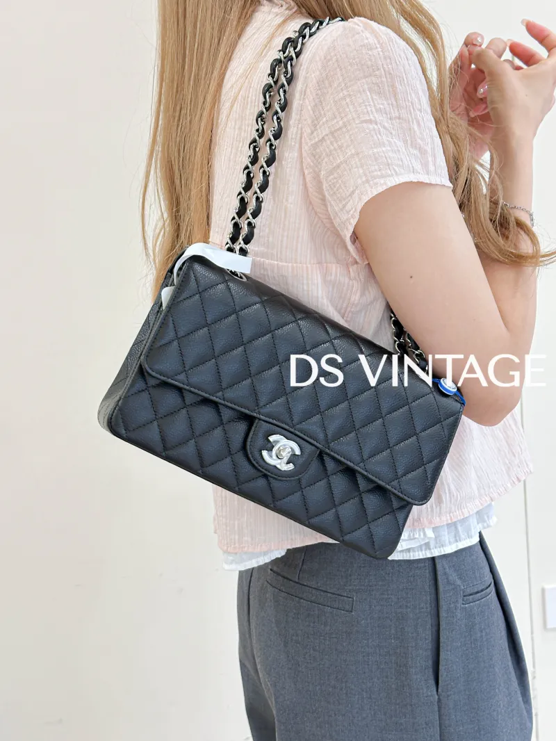 Chanel Crossbody Bag V Classic Flap CF Black Grained Calfskin Medium 25.5 × 6.5 × 15.5 cm 22 — on-model view 1 of 3