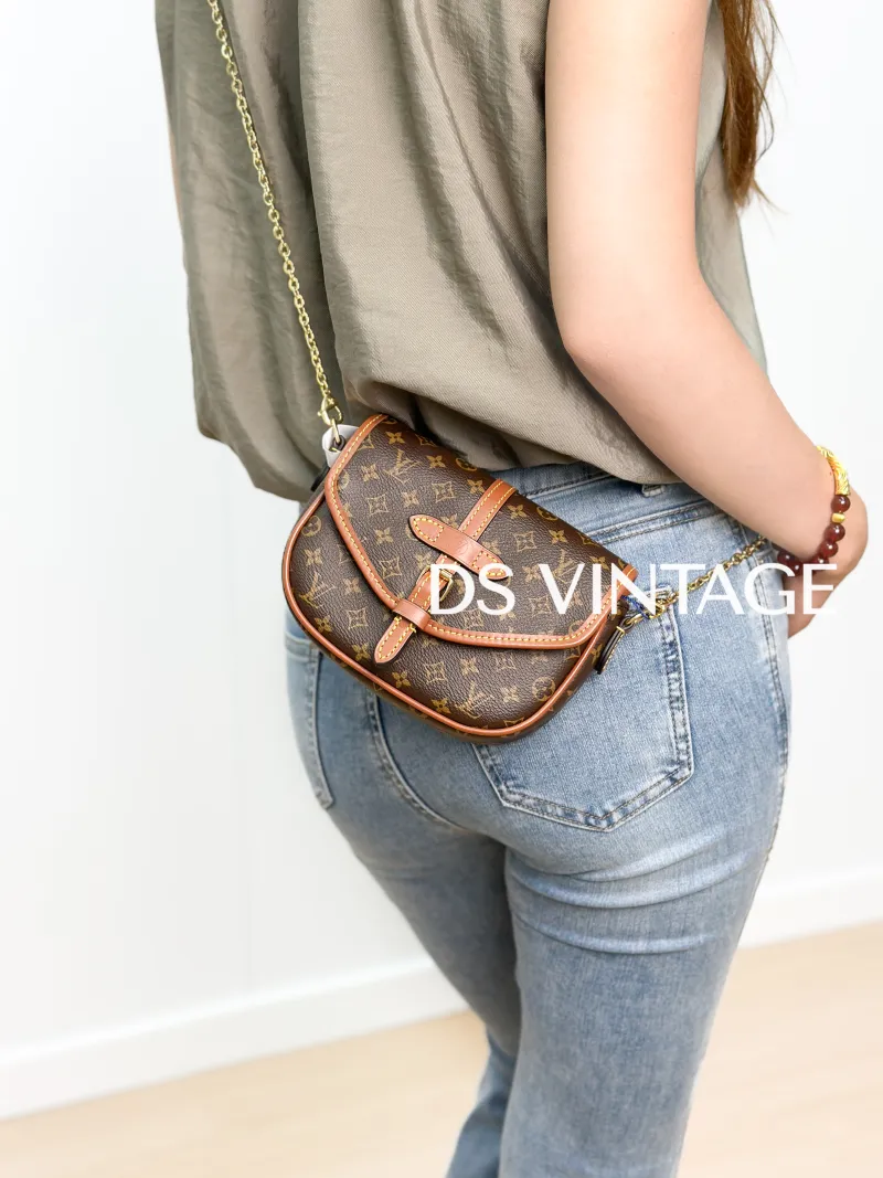 Louis Vuitton Crossbody Bag SOLO Monogram PVC One Size 16 × 4 × 12 cm Shoulder Strap — on-model view 1 of 3