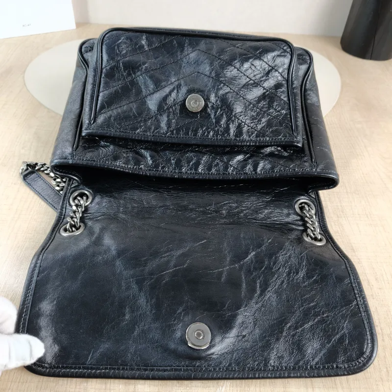 SAINT LAURENT Crossbody Bag Niki Black Waxed Leather Calfskin Medium 28 × 8.5 × 20 cm — detail view 10 of 13