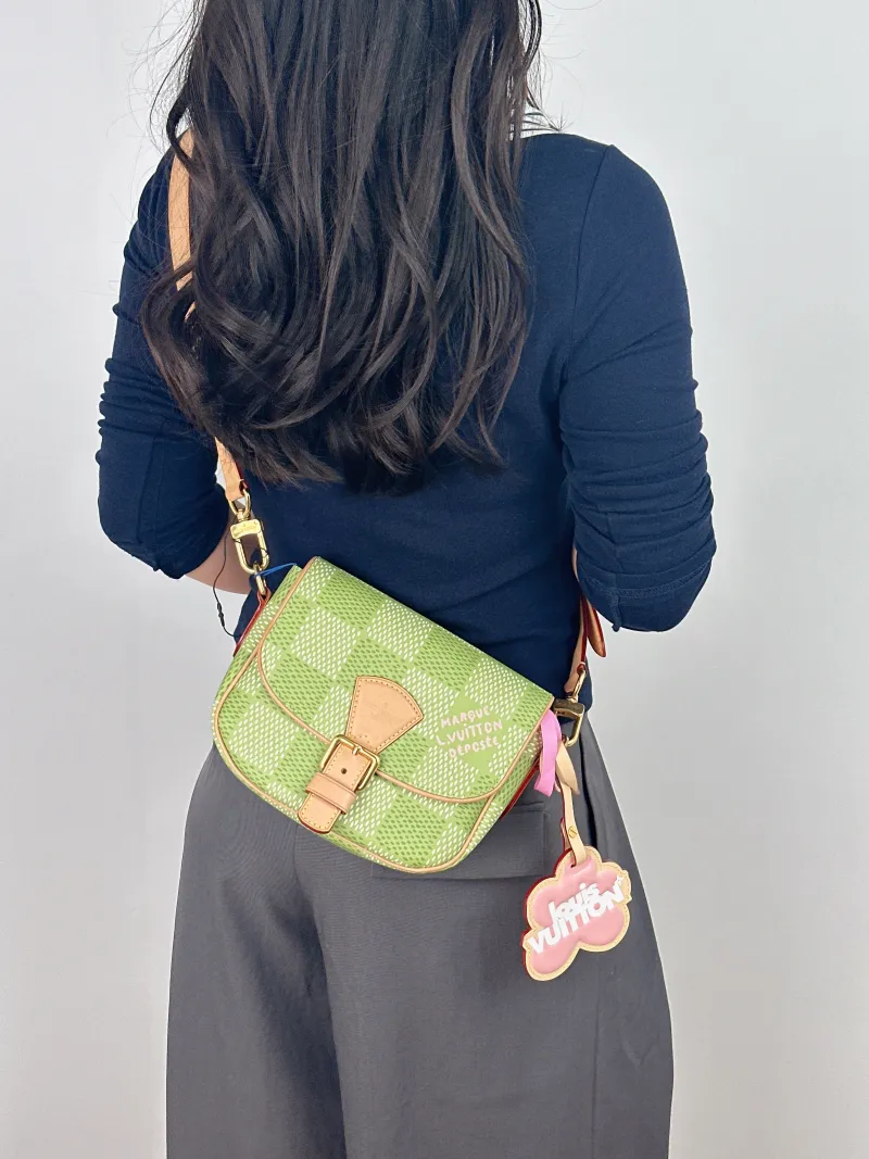 Louis Vuitton Crossbody Bag MONTSOURIS Messenger Bag Tyler PVC Small 20 × 7 × 17 cm — on-model view 1 of 2