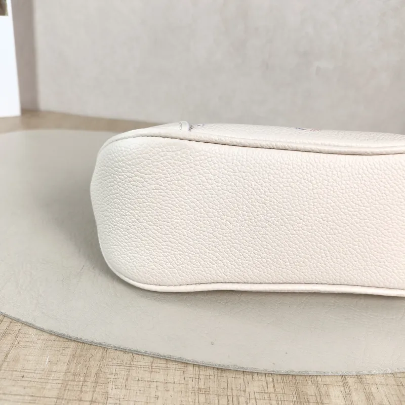 Louis Vuitton Crossbody Bag Boulogne White · Calfskin nano 19 × 8 × 13 cm — detail view 5 of 10