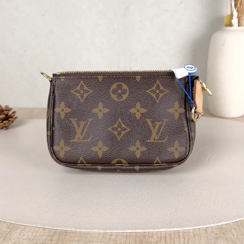 Louis Vuitton Clutch Mini Pochette Accessoires Monogram PVC Mini 15.5 × 4 × 10.5 cm — cover view 6 of 6