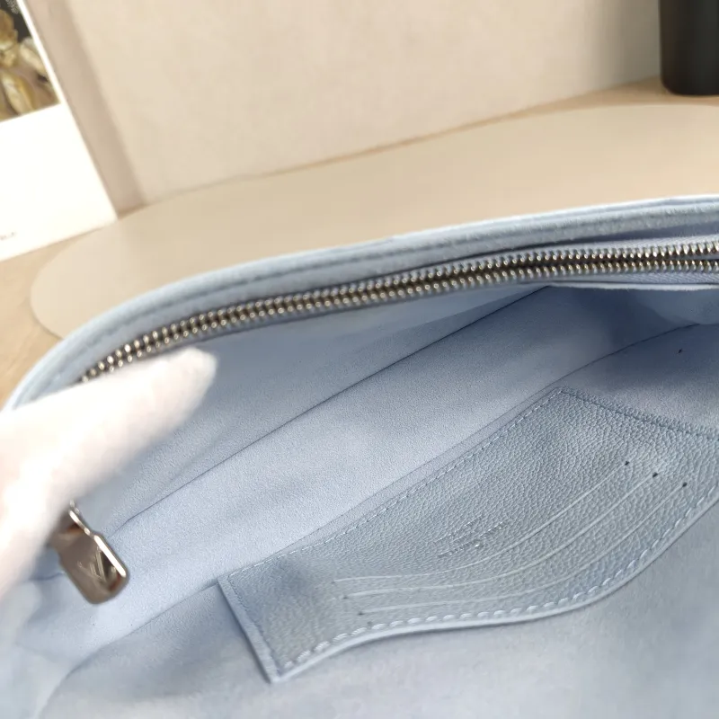 Louis Vuitton Crossbody Bag IVY Blue Empreinte Embossed Calfskin Small 23.5 × 4.3 × 12 cm — detail view 13 of 13