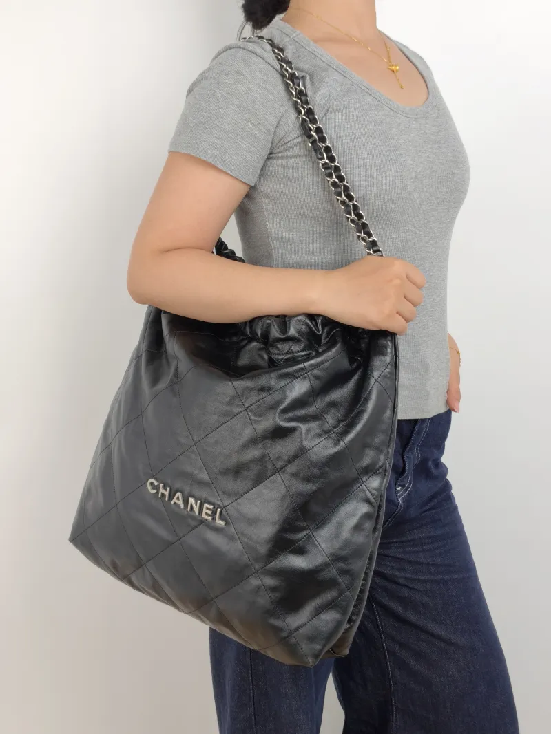 Chanel Shoulder Bag 22Bag Black CC alfskin Large 48 × 10 × 45 cm — on-model view 2 of 2