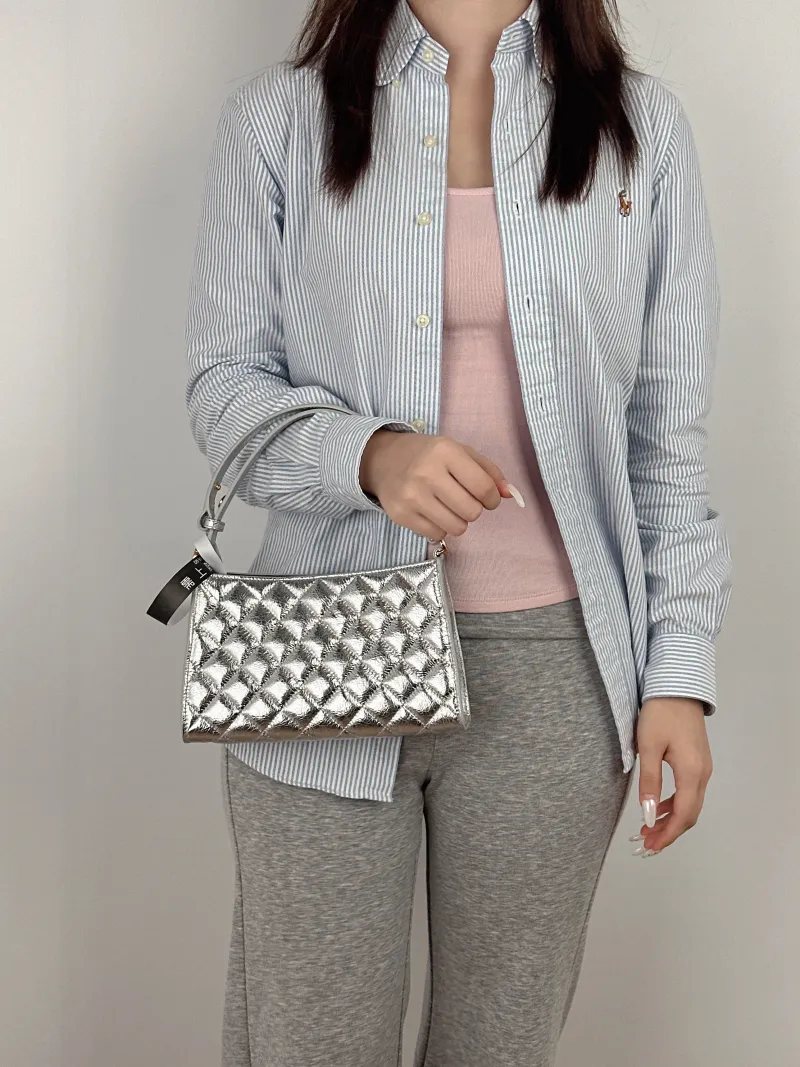 Chanel Shoulder Bag Silver Waxed Leather One Size 23 × 7 × 14 cm — on-model view 1 of 2