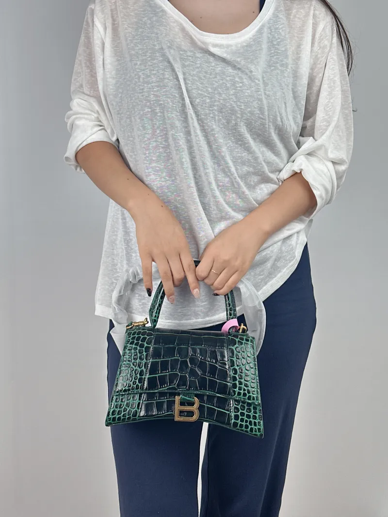 BALENCIAGA Crossbody Bag Hourglass Hourglass Bag Green Calfskin Small 23 × 10 × 14 cm — on-model view 1 of 2