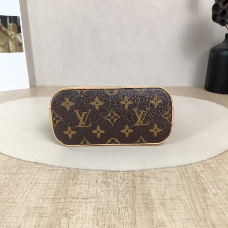Louis Vuitton Crossbody Bag Alma Nano Monogram · PV Cnano18 × 8 × 12 cm — cover view 3 of 6