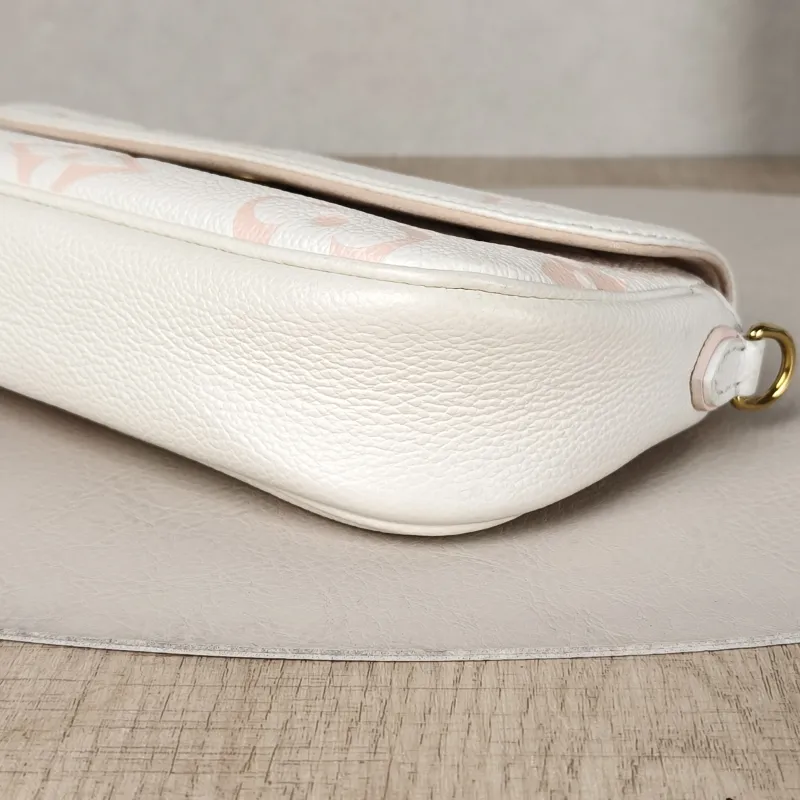 Louis Vuitton Crossbody Bag IVY White · Pink Empreinte Embossed Calfskin Monogram Small23.5 × 4.3 × 12 cm — detail view 2 of 13