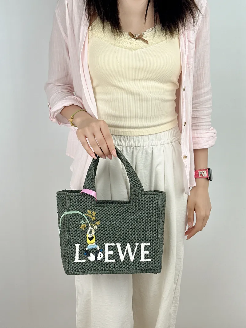 LOEWE Shoulder Bag Tote Bag Green Woven One Size 23 × 10 × 19 cm — on-model view 1 of 2
