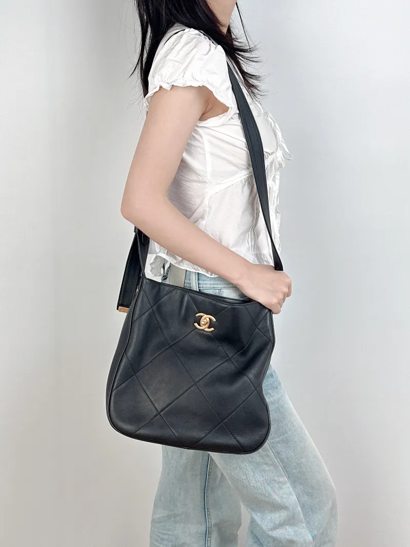 Chanel Shoulder Bag hobo Black Calfskin One Size29 × 6.5 × 27 cm — on-model view 1 of 3