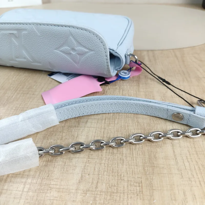 Louis Vuitton Crossbody Bag IVY Blue Empreinte Embossed Calfskin Small 23.5 × 4.3 × 12 cm — detail view 4 of 13