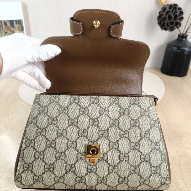 GUCCI Top Handle Bag Horsebit 1955Collection Top Handle Bag Monogram PVC Small 22 × 10.5 × 16 cm — detail view 1 of 12