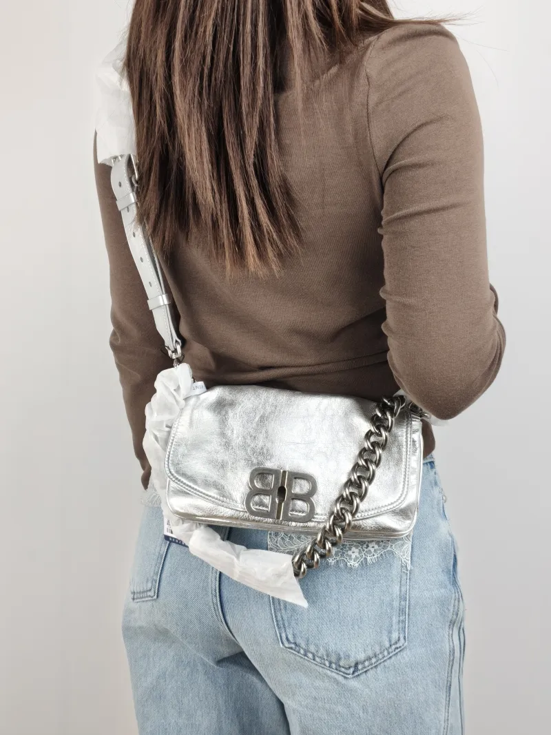 BALENCIAGA Crossbody Bagsoft bb Crossbody Bag Silver Calfskin 23.5 × 3 × 13.5 cm — on-model view 1 of 2