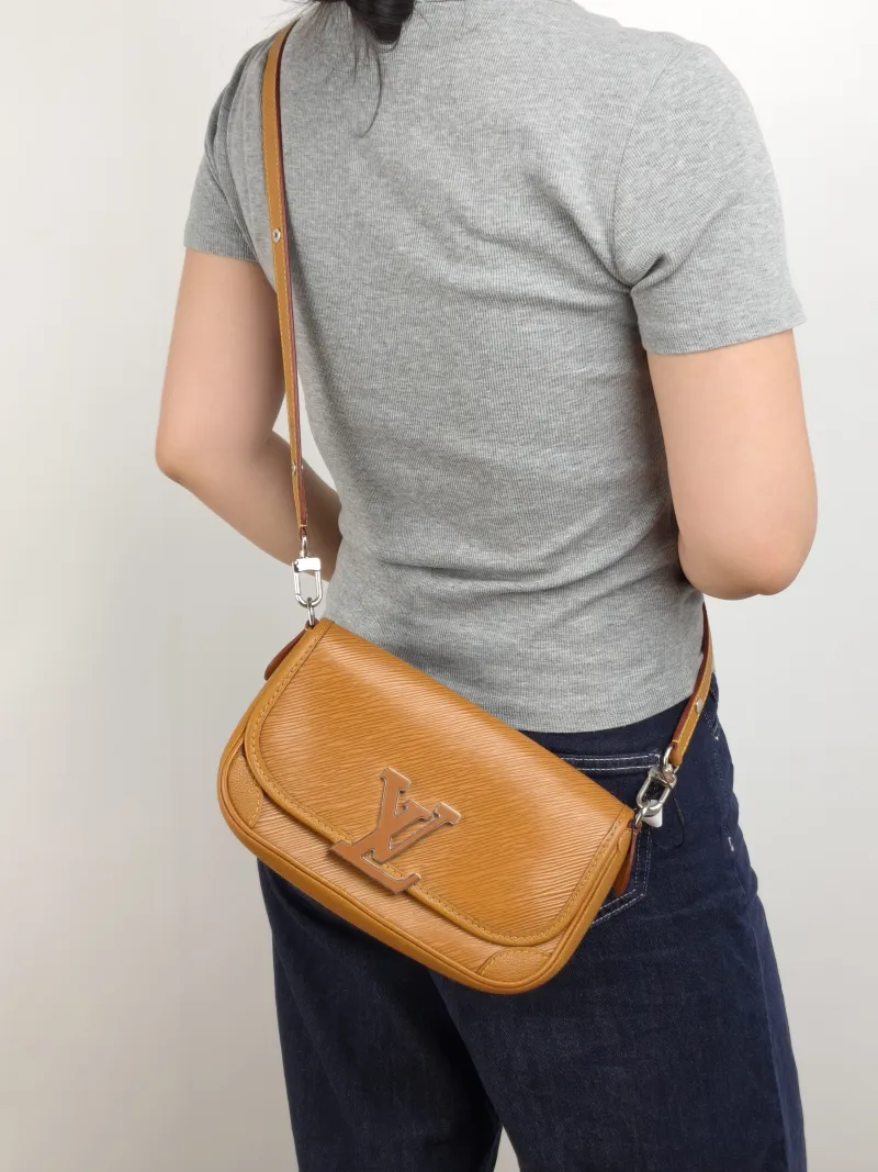 Louis Vuitton Shoulder Bag BUCI Epi Embossed Calfskin One Size 24.5 × 9 × 15.5 cm — on-model view 1 of 2