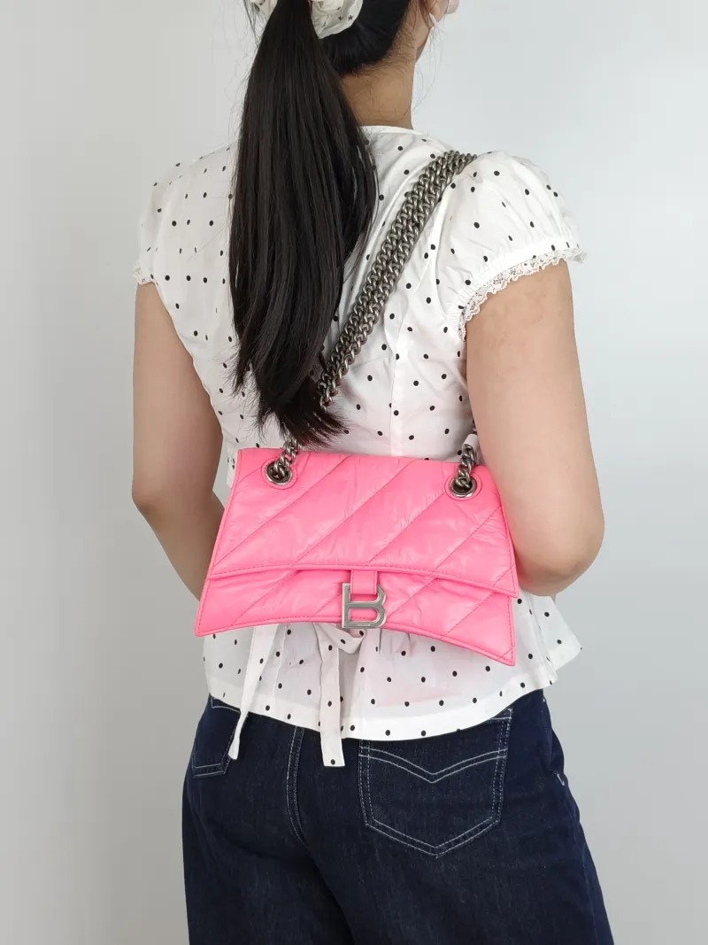 BALENCIAGA Shoulder Bag CRUSH Chain Bag Neon Pink Calfskin Small25 × 8 × 15 cm — on-model view 2 of 3