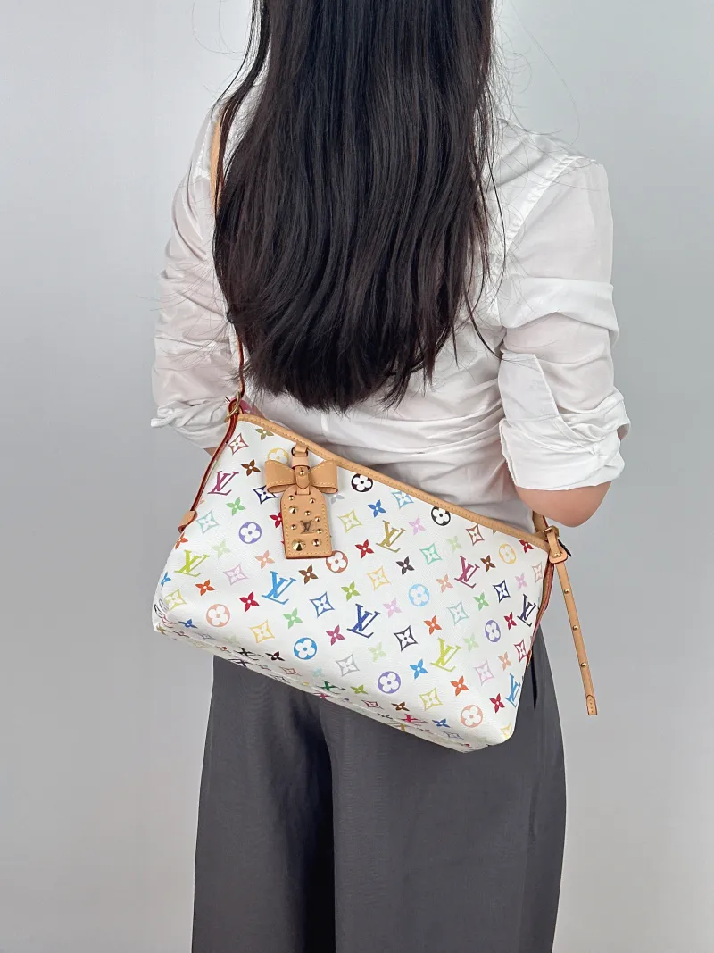 Louis Vuitton Shoulder Bag Carryall East West Multicolore PVC One Size 36 × 10 × 19 cm — on-model view 1 of 2