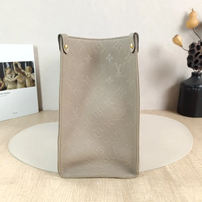 Louis Vuitton Shoulder Bag Onthego Medium Monogram Empreinte Embossed Calfskin Medium 35 × 14 × 27 cm — detail view 11 of 11