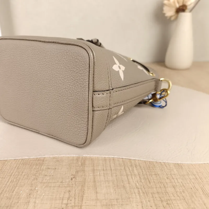 Louis Vuitton Crossbody Bag NANO NOÉ Bucket Bag Nano · White Empreinte Embossed Calfskin Monogramnano13 × 10 × 16 cm — detail view 8 of 11