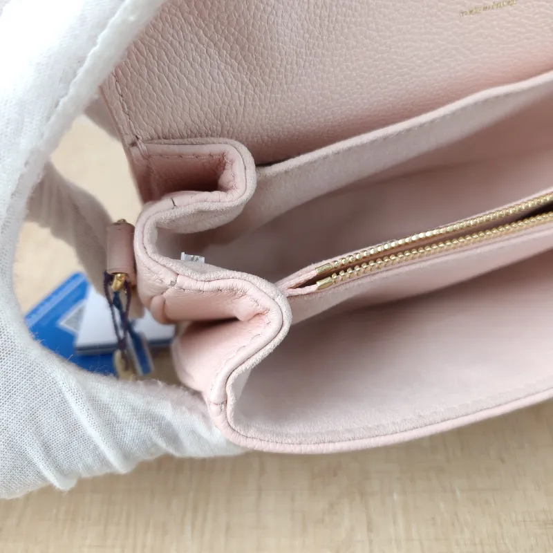 Louis Vuitton Crossbody Bag Pochette Métis East West Monogram Empreinte Embossed Calfskin Small 21.5 × 6 × 13.5 cm — detail view 10 of 14