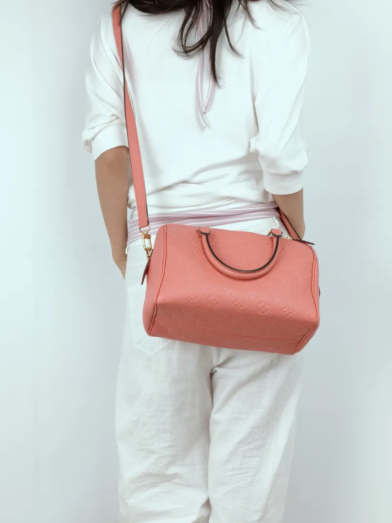 Louis Vuitton Top Handle Bag Speedy25 Pink Calfskin Medium25 × 15 × 19 cm — on-model view 2 of 3