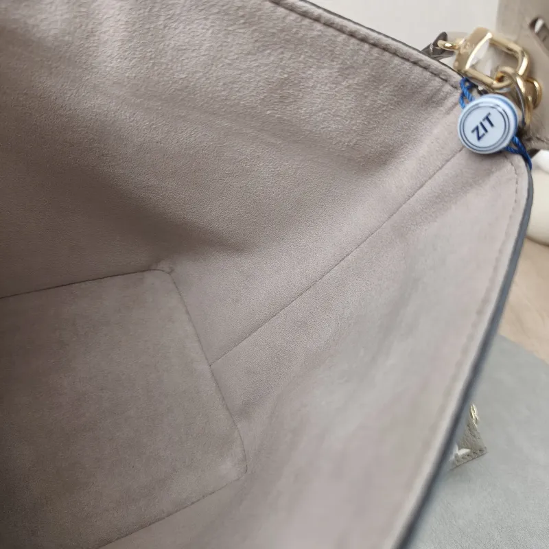 Louis Vuitton Top Handle Bag ALL IN BB · White Empreinte Embossed Calfskin BB 16 × 12 × 18 cm — detail view 9 of 14