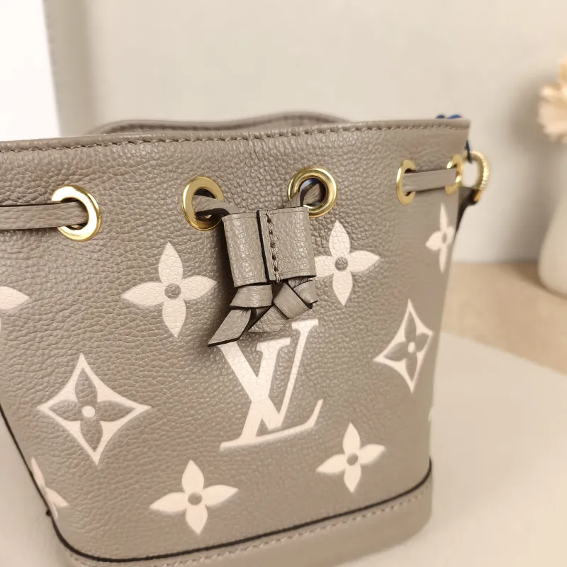 Louis Vuitton Crossbody Bag NANO NOÉ Bucket Bag Nano · White Empreinte Embossed Calfskin Monogramnano13 × 10 × 16 cm — detail view 7 of 11